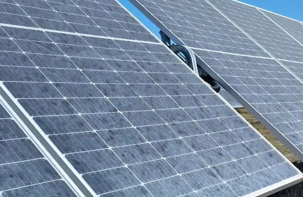 Solar panel heavily covered in dust and dirt in a dry UK environment reducing solar energy production efficiency